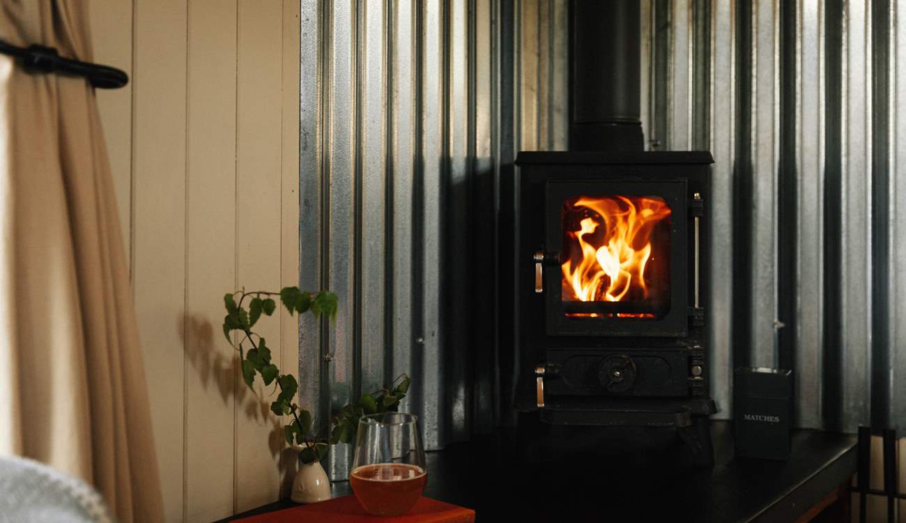 On cooler days get cosy by the wood burner. 
