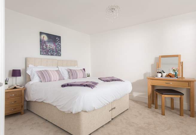 This charming ground floor bedroom can be a king-size bed or zip and link single beds (Bedroom 1).