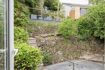 The terrace garden to the rear with steps up to your car parking space at the top.