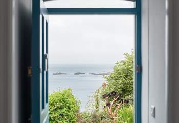 The view from the front door of the cottage, from here you can walk along the coast path to the village and the beach.
