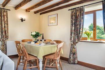You may enjoy meals at the dining-table...