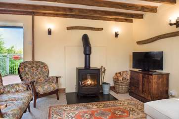 Snuggle up with a good book in front of the toasty wood-burner.