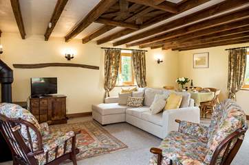 The sitting/dining-room is full of character.
