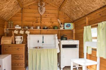 What fun they will have in their own little cottage - please take care with young children and small items.