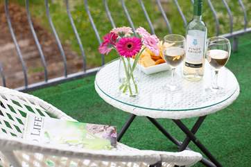 The balcony is a great place to sit back, relax and enjoy a glass of wine.
