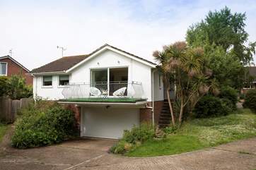 In a secluded plot within a few minutes walk of Seagrove Bay (please note there are several steps up to the front door).