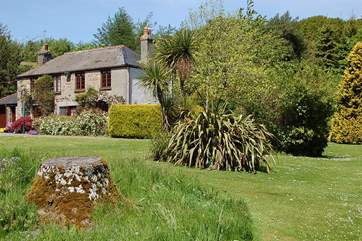 Looking across at Ullacombe Cottage from one of the many beautiful spots within the gardens.