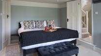 The master bedroom has this fabulously huge super-king size bed.