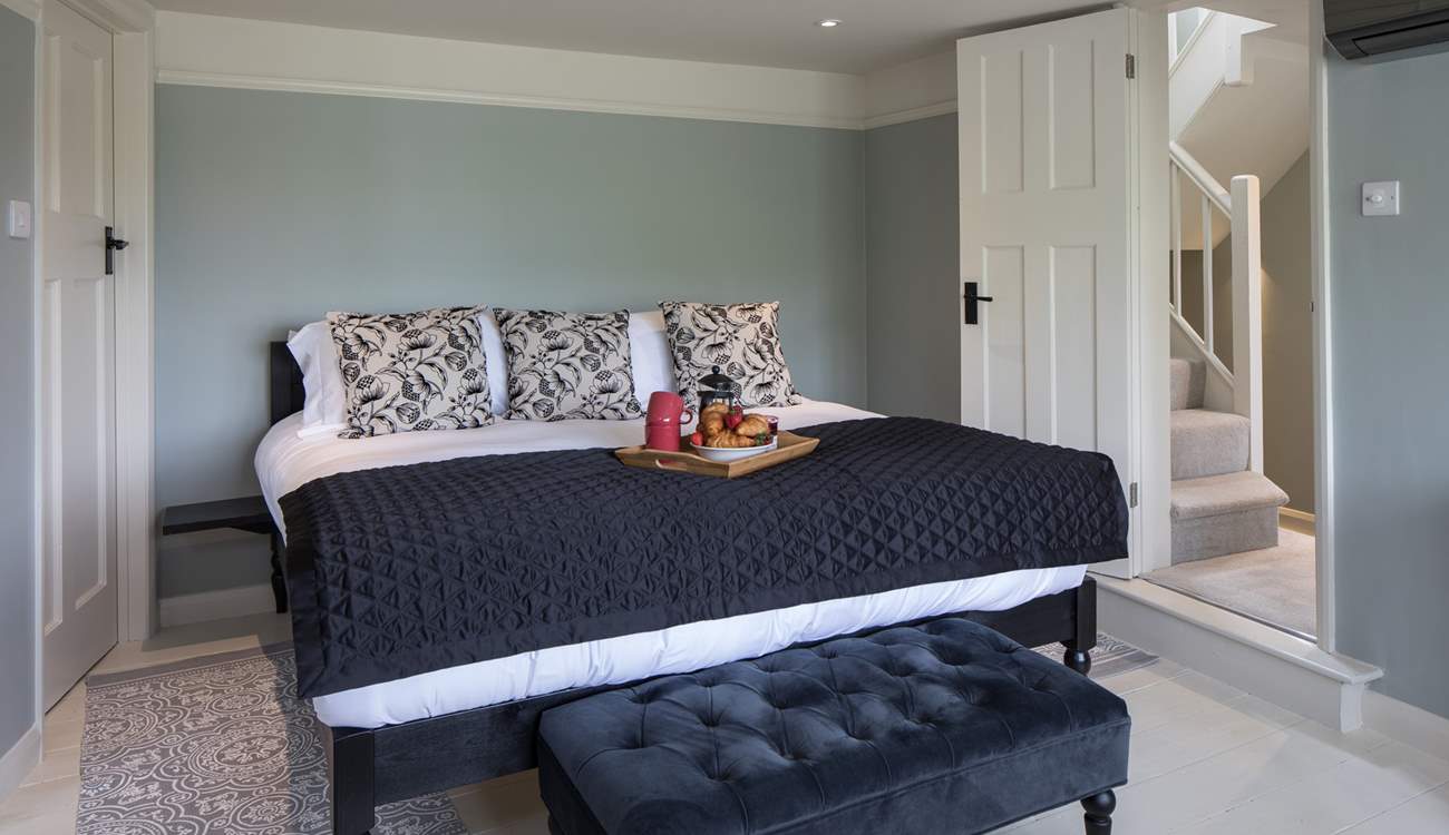 The master bedroom has this fabulously huge super-king size bed.