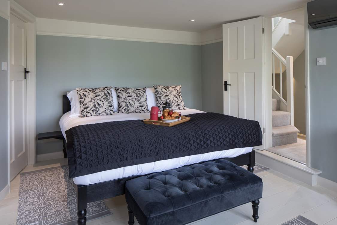 The master bedroom has this fabulously huge super-king size bed.