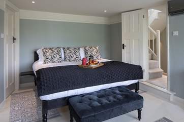 The master bedroom has this fabulously huge super-king size bed.