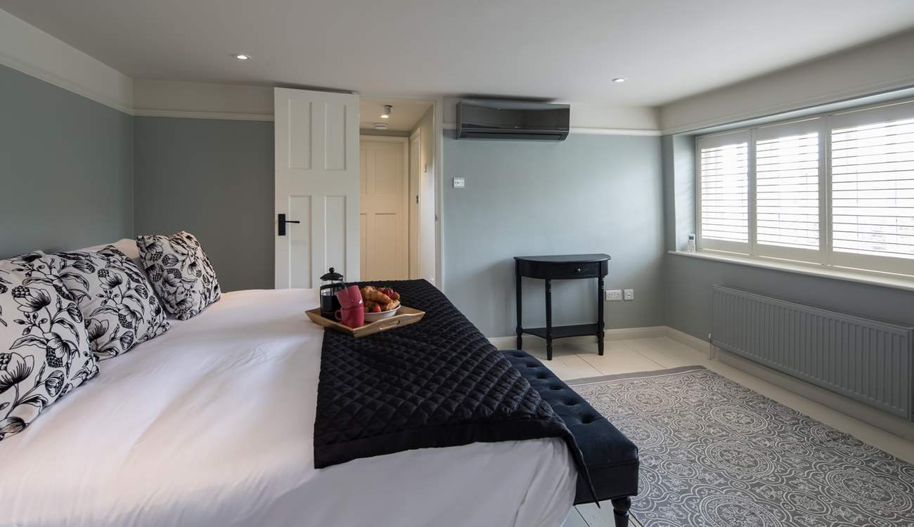 Looking back through to the hallway from the en suite bathroom.