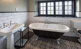 The en suite to the master bedroom comprises of a superb roll-top bath and luxury shower cubicle. - Thumbnail Image