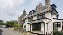 This cottage offers parking right outside your door.
