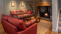 The cosy sitting-room is such a great place to snuggle up and relax following an action-packed day.