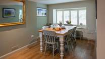 Gathering around this beautiful dining-table is the perfect way to enjoy any meal.
