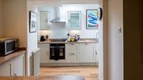 Peeking into the kitchen you will see the Nespresso coffee machine. Spoil yourself with the perfect cup of coffee.