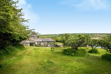 Goose Barn enjoys a wonderful rural setting yet is so close to the coast - you can see the sea from the top of the garden.