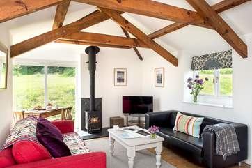 The double aspect sitting/dining-room is wonderfully light and airy.