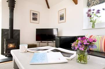 Snuggle up with a good book or watch a holiday film in front of the toasty wood-burner.