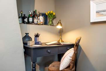 Should you need to work whilst on holiday there's a handy desk provided above which, sits an honesty bar kindly provided by the owners.