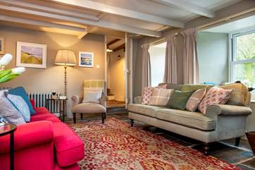 The sitting-room invites you to unwind and relax.