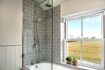 The family bathroom enjoys views across the Cornish countryside.