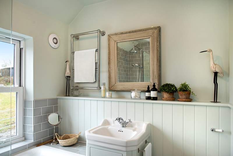 The bathroom is as stylish as the rest of the cottage.