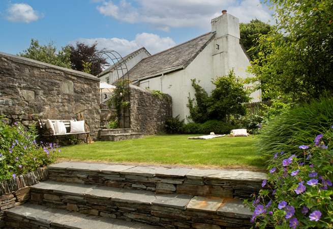 The sunny garden is the place to relax.,