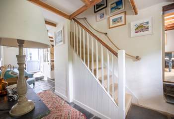 When it's time for bed, 3 beautiful bedrooms await at the top of the stairs.