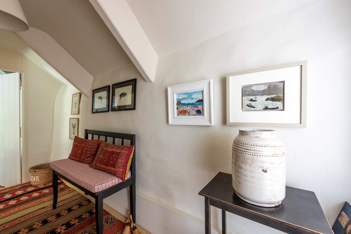 The upstairs corridor also gets the style treatment.