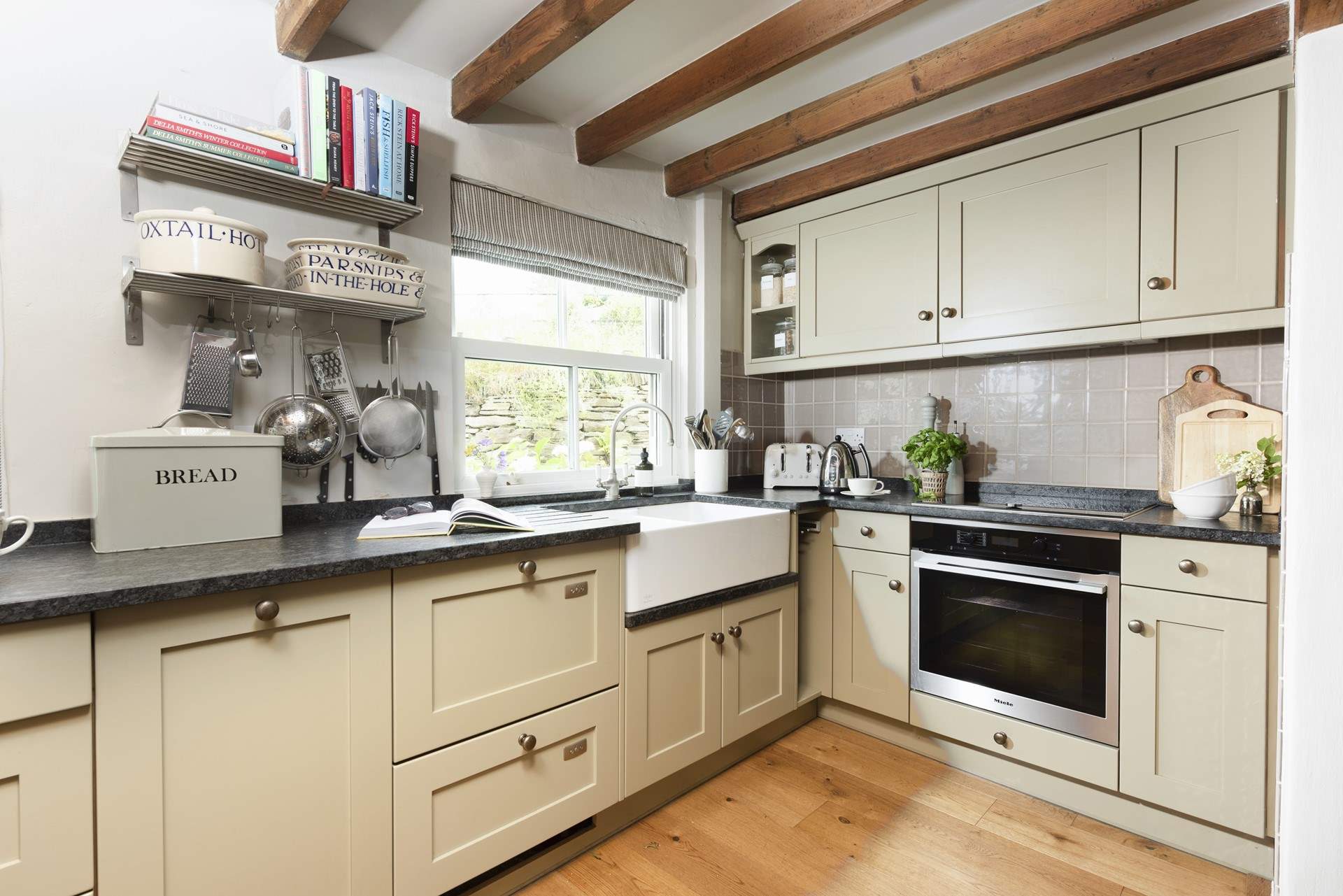 The shaker style kitchen perfectly complements Kear Cottage.