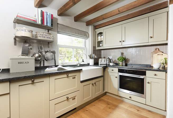 The shaker style kitchen perfectly complements Kear Cottage.