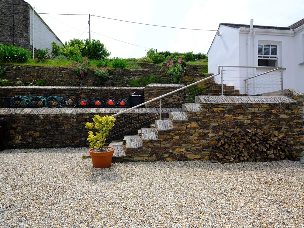 A series of steps lead up to the terraced garden.