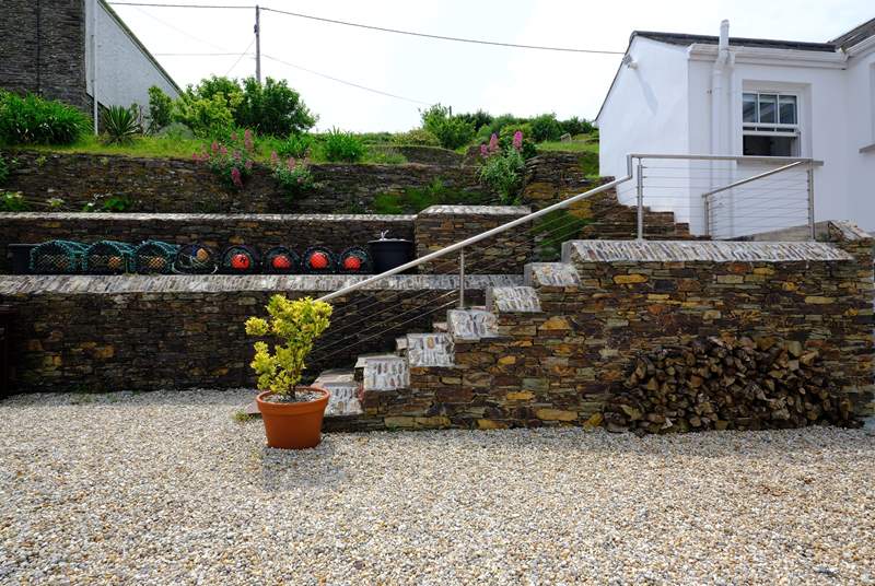 A series of steps lead up to the terraced garden.