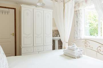 The double bedroom has a sink, perfect for brushing those pearly whites before bed.