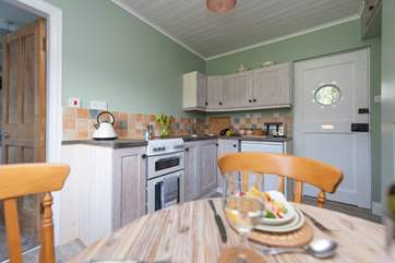 Another view of the kitchen and dining-area.