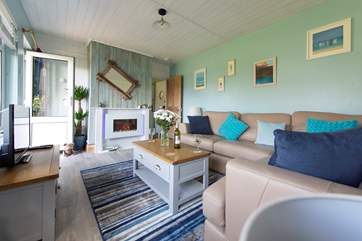 A modern pebble-effect electric fire will keep you warm and cosy throughout the year.
