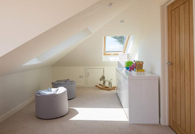 The family room has been carefully designed to offer all members of the party 'that special space'. A TV is being placed on the wall behind the toys, which will make this snug a brilliant place.