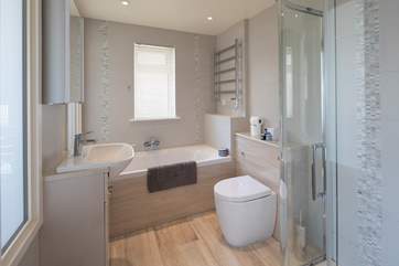 En suite to the master bedroom has a bath and a glorious walk-in shower.