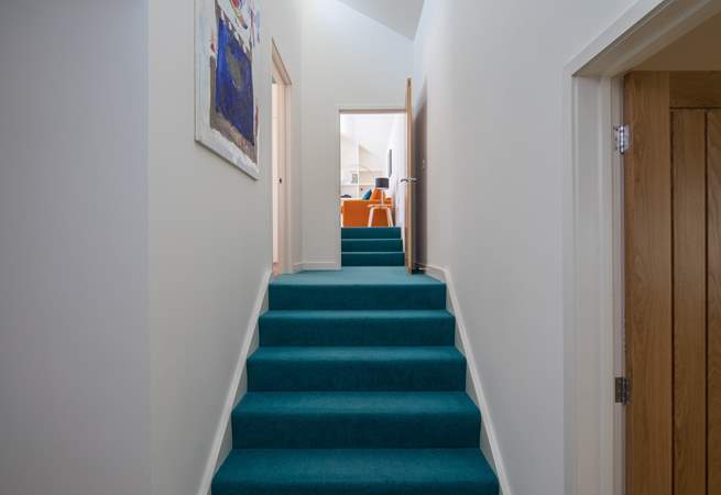 Access to Bedroom 3 and the poolside games-room/snug is up this subtle flight of stairs.