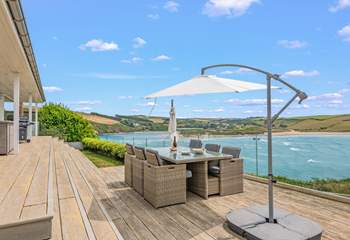 Step out of the living area onto your decked patio and breathe in the sea air.