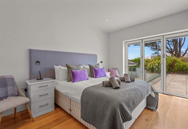 Bedroom 3 is extremely pretty and is rather special as it opens up alongside the pool. Roll out of bed and straight into your swimwear.