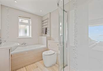 En suite to the master bedroom has a bath and a glorious walk-in shower.