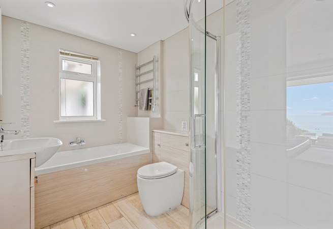 En suite to the master bedroom has a bath and a glorious walk-in shower.
