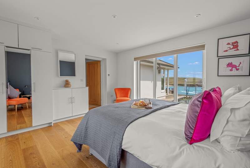 Bedroom 2 offers extra sleeping flexibility as can be configured as a king-sized double, or 2 single beds. This lovely room opens out onto the rear of the house, enjoying views out to sea.