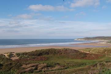 North Devon has some incredible sandy surfing beaches as well as the cliffs and rocky coves. This is Woolacombe.