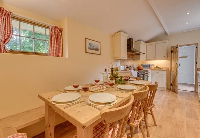 There is a lovely farmhouse dining table with plenty of space for all eight guests at The Bear.