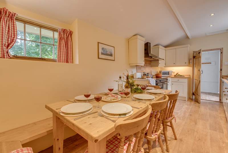 There is a lovely farmhouse dining table with plenty of space for all eight guests at The Bear.
