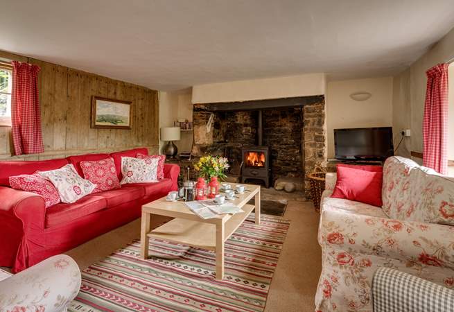 There is a traditional inglenook fireplace and wood-burning stove at the heart of this lovely quirky historic house.